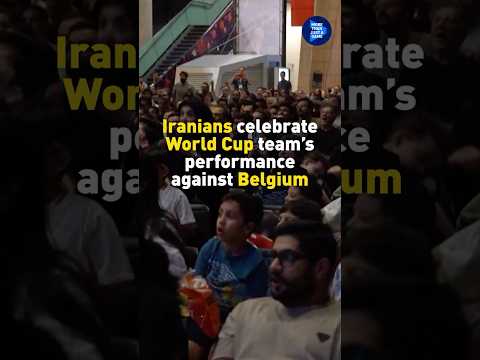 Iranians celebrate World Cup team's performance against Belgium