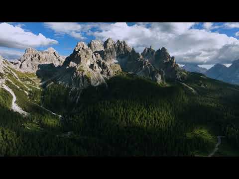 Aerial view tilting toward the cadini di misurina massif, in sunny dolomites, italy FREE STOCK VIDEO