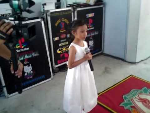 7 years old fadilah singing