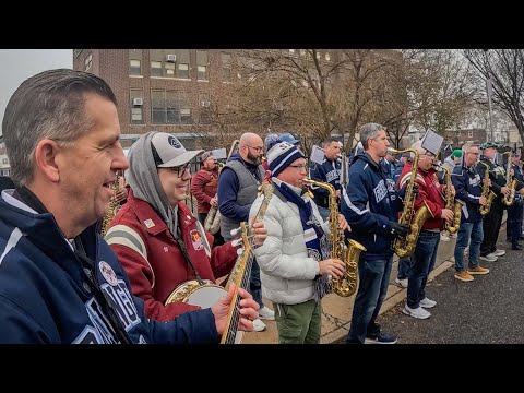 Christmas string band gives back in memory of Mummers members
