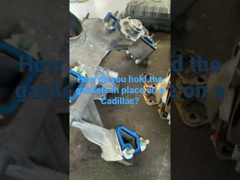Tip for holding crossover gaskets in place on a Cadillac water pump repair…