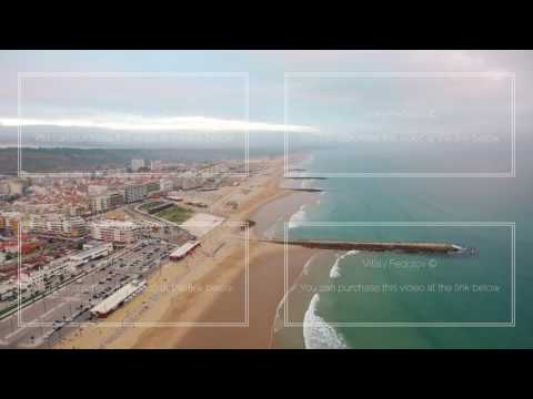 Panorama of Costa Caparica beach at evening aerial view
