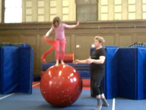 Ribbon twirling on rolling globe