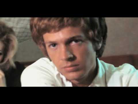 Trailer frame highlighting interviewees reacting to Scott Walker’s music
