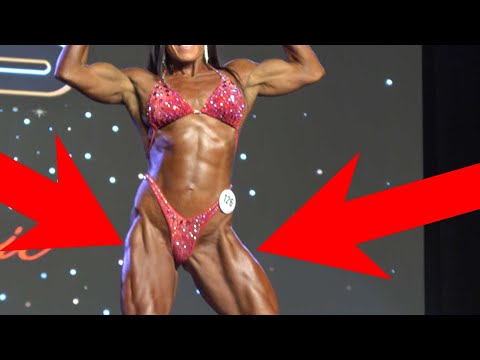 Muscular Janee Jones confidently posing in 4K