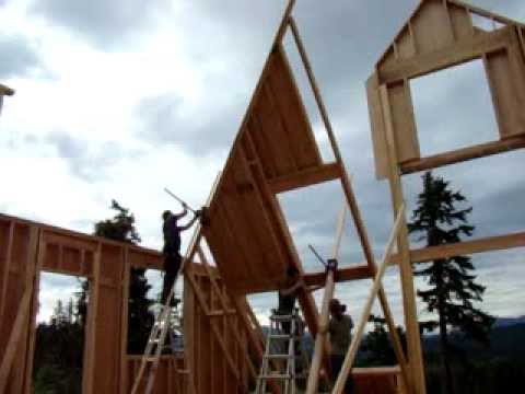 Lifting a tall wall with wall jacks