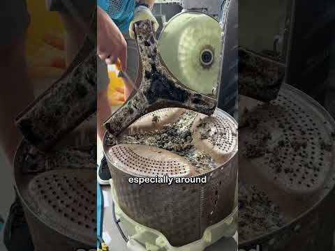 cleaning a front-loading washing machine that's been used with low-quality detergent for a long time