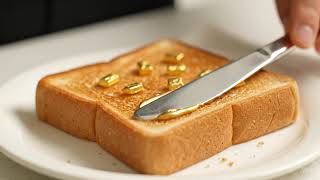 Google Veo 3 Fast Sample Video - Golden Spread Toast ASMR