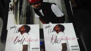 Wale of Maybach Music Group Signing Autographs