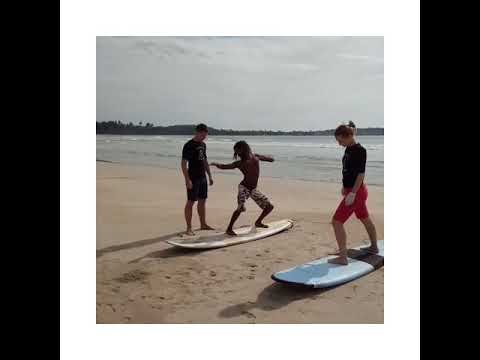 Surfing lessons at moon River unakuruwa