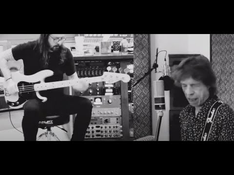 Mick Jagger (Rolling Stones) debuts new song “Eazy Sleazy” w/ Dave Grohl (Foo Fighters)