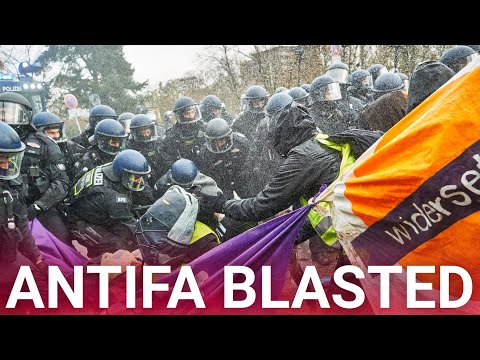 Antifa protesters blasted with water cannons during demonstration of hard-right German party