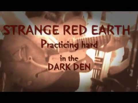 STRANGE RED EARTH IN THE DARK DEN PRACTICING NEW TUNE    THE KILLER :-)