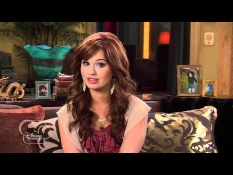 Thumbnail of the video: Jessie | Behind The Scenes: Jessie with Debby Ryan 💛 | Disney Channel UK