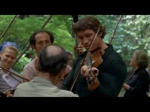 Arnold playing violin from stay hungry