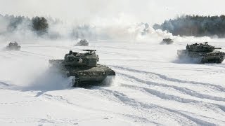 preview picture of video 'SHENYANG military area command tank driver drills with dance of tank on the icy water'