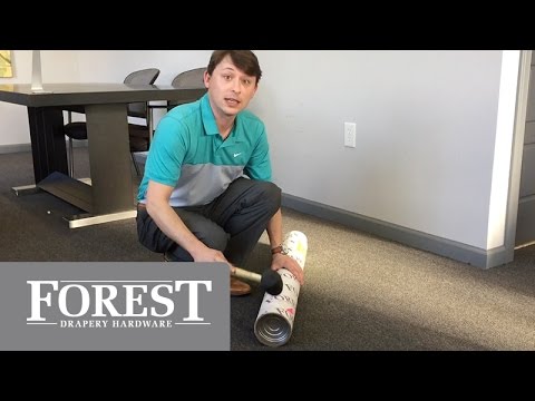 Part of a video titled How to Open a Forest Drapery Hardware Shipping Tube - YouTube