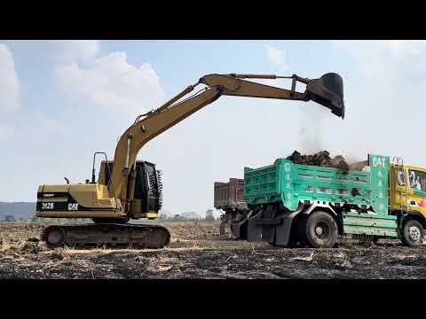 Excavator350 Loading Caterpillar 777C-D Dumpers - Sotiriadis/Labrianidis - Drone View