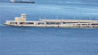 preview picture of video 'Hood Canal Bridge in Tow past our house, 5 17 09'