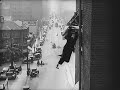 Buster Keaton attempting to jump between two buildings in Three Ages (1923).