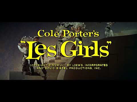 Trailer frame: courtroom-to-stage crosscut that sets up the film’s memory-flashback numbers