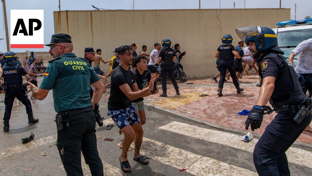 Thousands cross from Morocco into Spanish territory of Ceuta