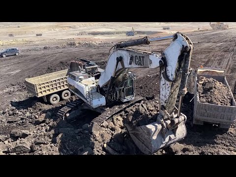 Caterpillar 375 Excavator Loading Trucks With Three Passes