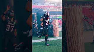 Running out of the tunnel on game day