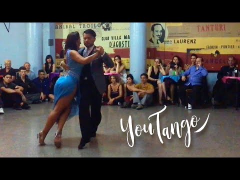  Johana Copes  and  Cristian Sosa  are  dancing  to  the  tango  "  Ataniche  "  by  Juan D'Arienzo  in  2019