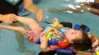 Kayli kicks her legs in aquatic therapy!
