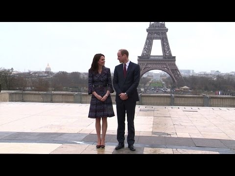Kate and William play rugby in front of Paris' Eiffel Tower