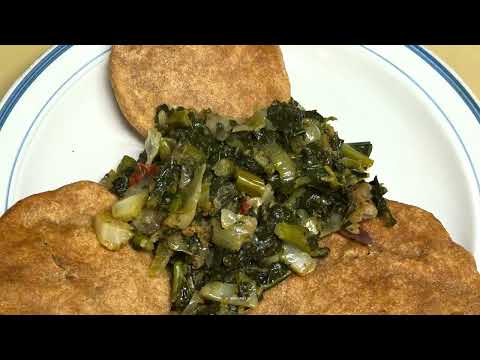 Jamaican Flat Fried Dumplings And Steamed Callaloo