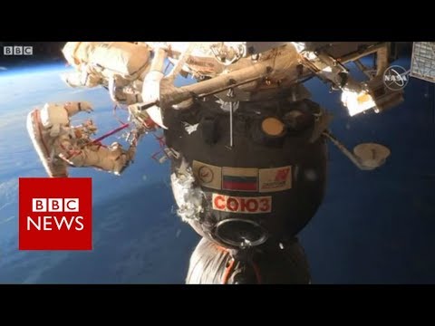 Samples cut around Soyuz hole in spacewalk - BBC News