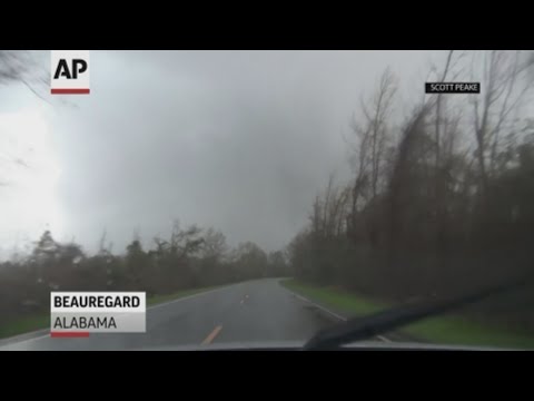 A storm chaser captured the moment a tornado hit Beauregard in Alabama killing at least 23 and injuring more than 90 people. (March 5)