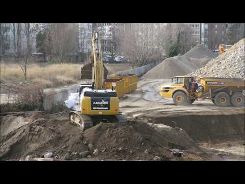 Bagger CAT 352F XE und Volvo Dumper