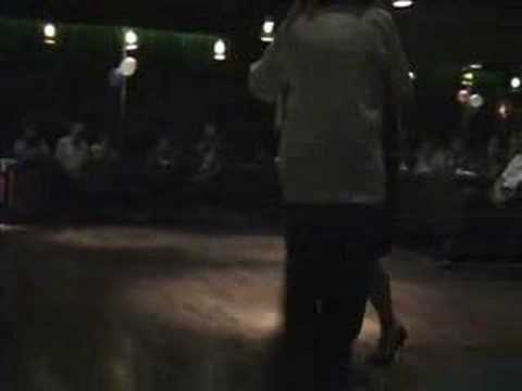  Rubén Harymbat  and  Susana Miller  are  dancing  to  the  tango  "  El Acomodo  "