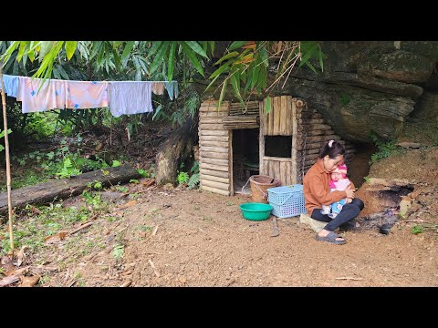 A single mother rebuilds her wooden house under a large rock – a journey to start a new life.