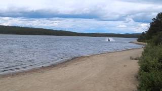 preview picture of video 'Snowmobile on lake, water riding in Finland - video'