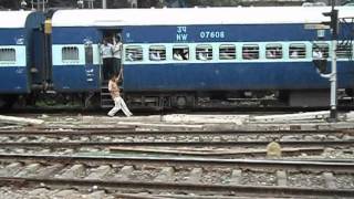 preview picture of video 'Silly people risking their lives in a running train!!!'