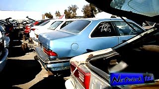 Walking around in the junk yard, looking for spare car parts