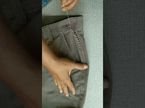 Sewing method for tightening the fit at the waist of loose trousers