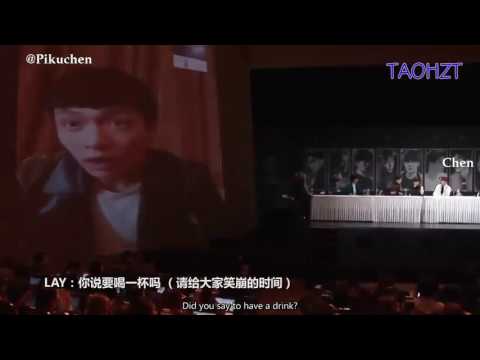 Chen (첸) laughing hard and falling from his chair when Yixing misheard the MC