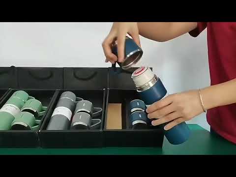 GARRAFA TERMICA COM XICARA STANLEY *
