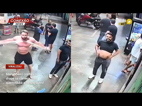 Marombeiro confere o shape na câmera, mas quem rouba a cena é outro!