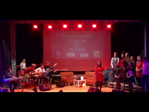 Znie zvuk bubnov Shalom & Kapela