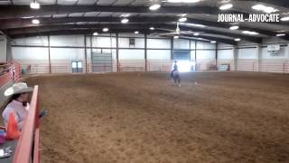 Clarissa Coakley runs the horsemanship pattern in the Sr. Working Cow Horse division of the Horse Sh