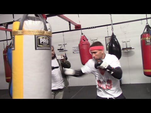 VASYL LOMACHENKO WORKS ON HIS TECHNIQUE ON THE HEAVYBAG @ OFFICIAL MEDIA WORKOUT