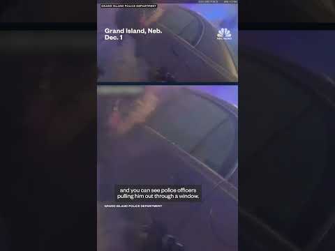 Officers rescue driver from burning vehicle