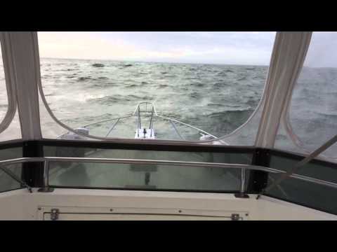 41' Egg Harbor coming through big waves in Barnegat Inlet
