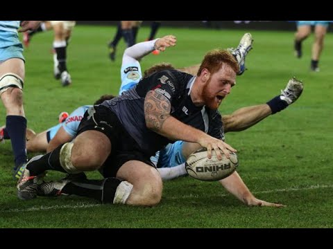 Dan Baker smashes Guglielmo Palazzani out of the road